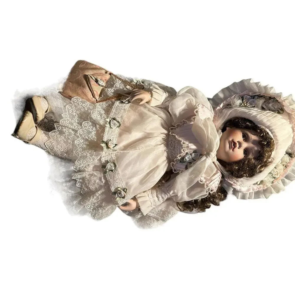 Doll 25” large made Bella rose I call her Bella the porcelain doll she is very h
